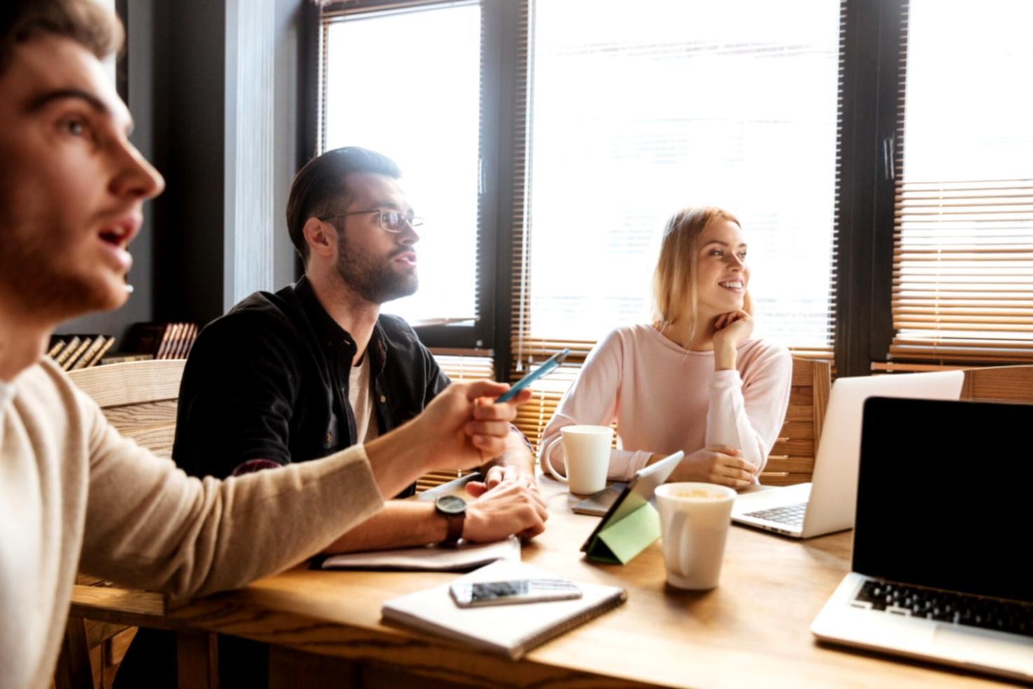 Business consultation session with documents and planning materials